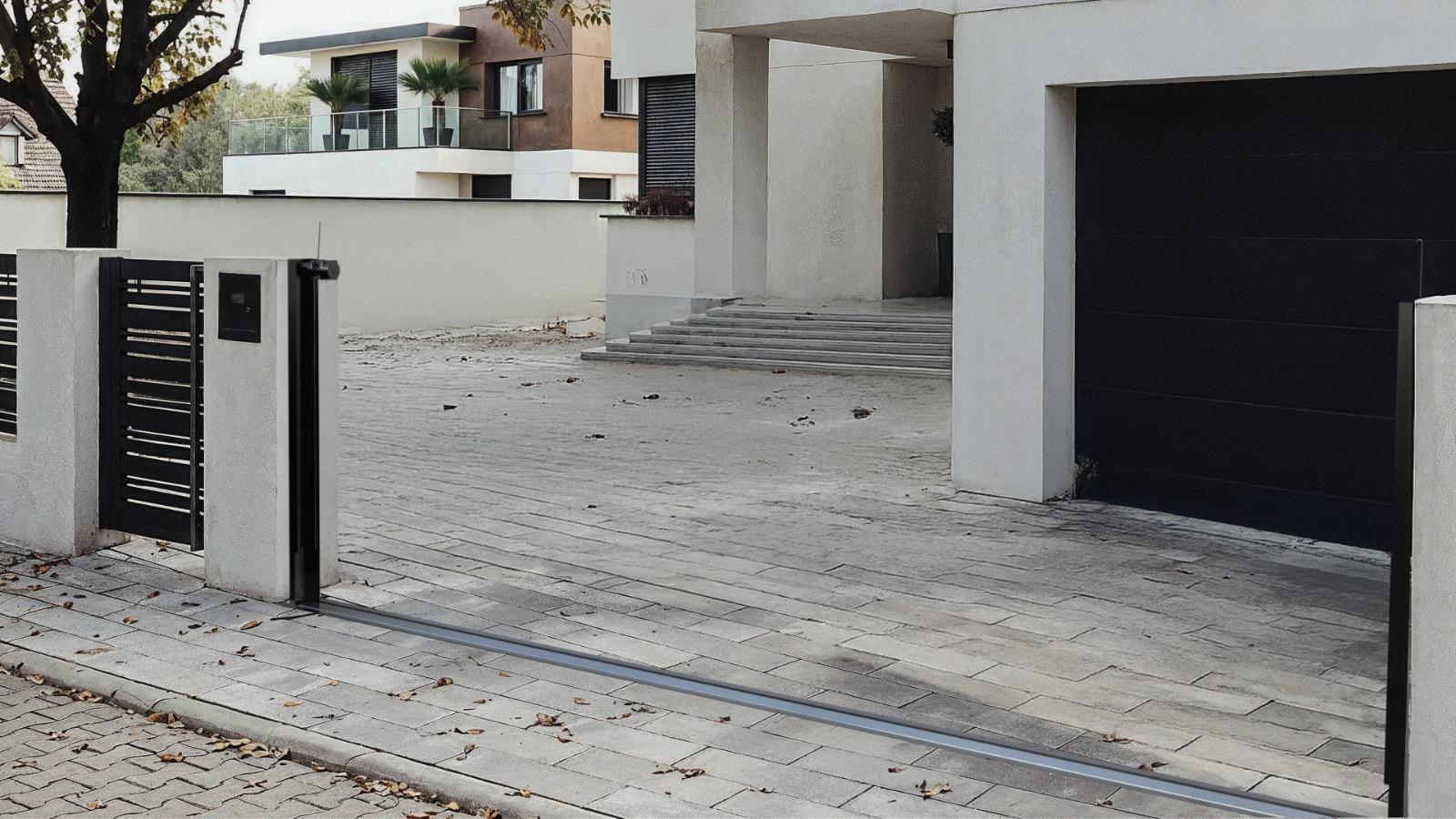 Modern home driveway with a HiddenGate sliding gate